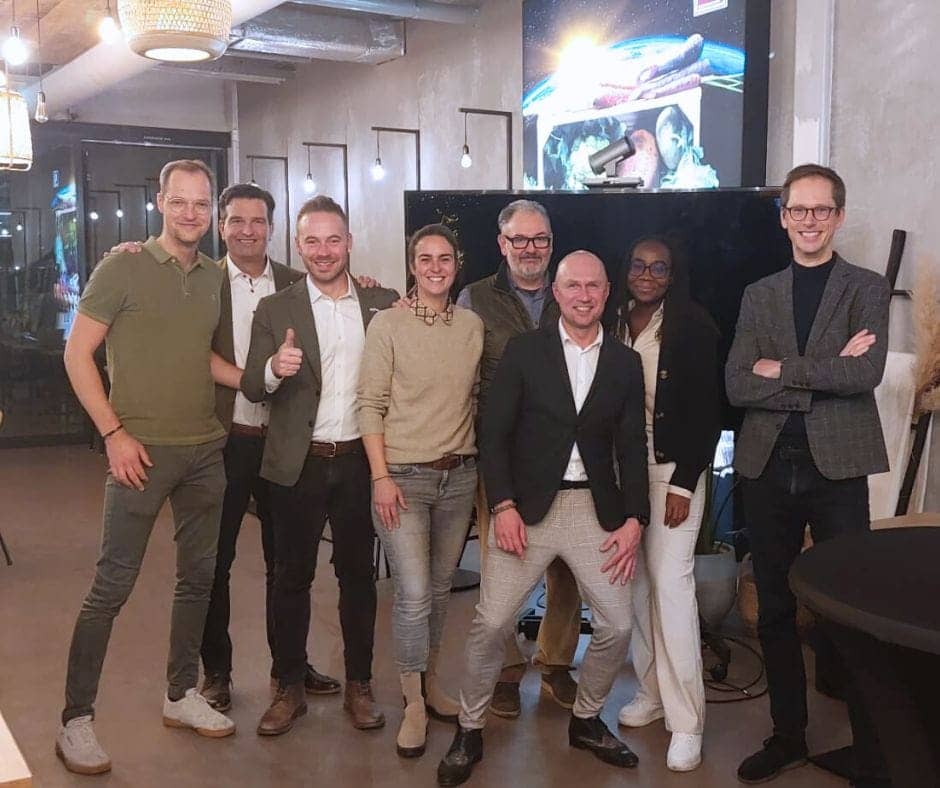 A group picture or Trevor Terry along with partners from NLWorks like Daniel and Tracy